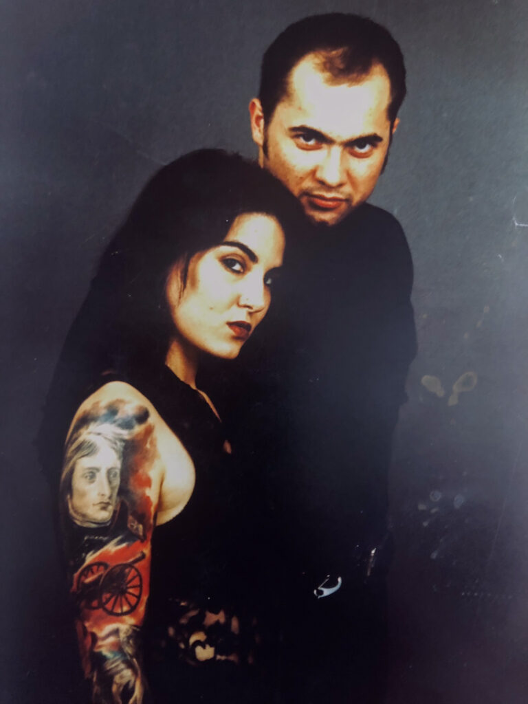 Stéphane and Chantal Chaudesaigues, portrait with colour tattoo sleeve, Graphicaderme France
