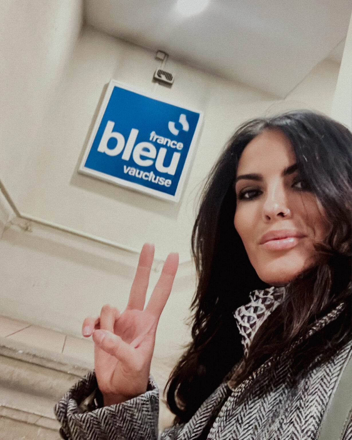 Tattoo artist Tamara Chaudesaigues during a radio interview, featured on France Bleu Vaucluse, working between London and France