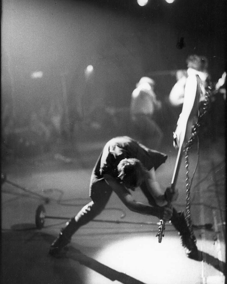 The Clash performing live, London Calling era, raw punk rock energy on stage