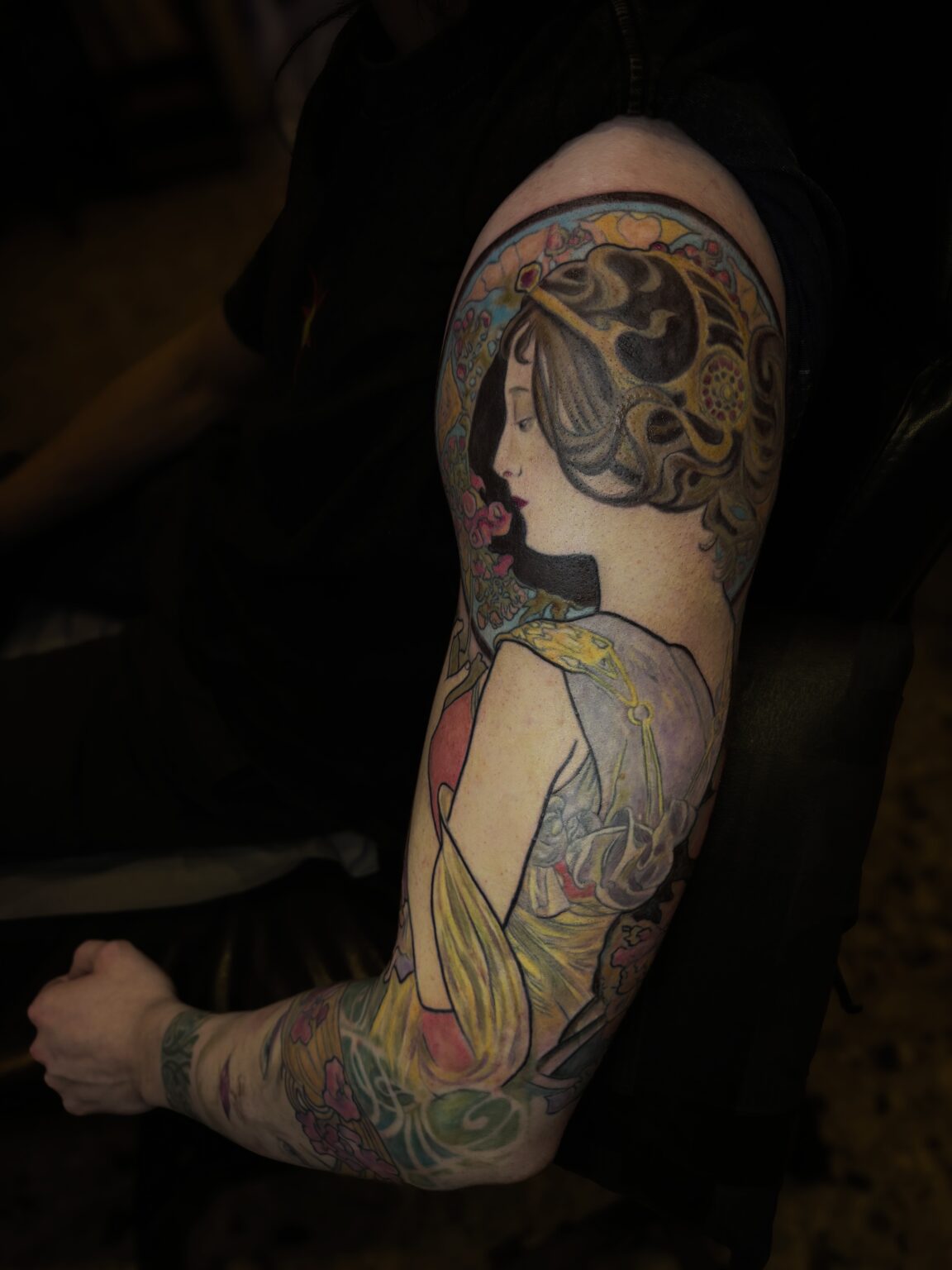 Art Nouveau colour arm tattoo inspired by Mucha, feminine composition adapted for the body by Tamara Chaudesaigues in Avignon
