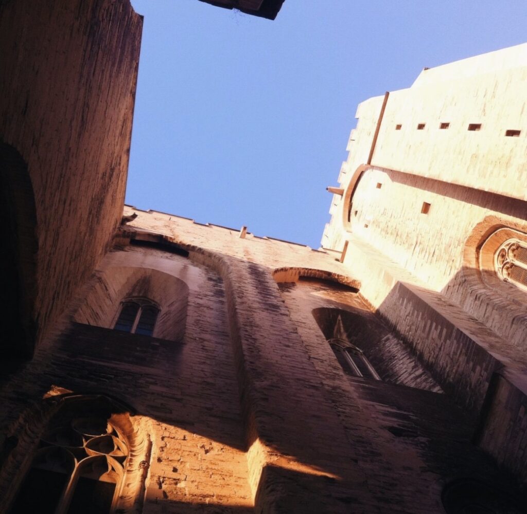 Double photographic exposure of the Palais des Papes and the Rhône in Avignon during the Festival
