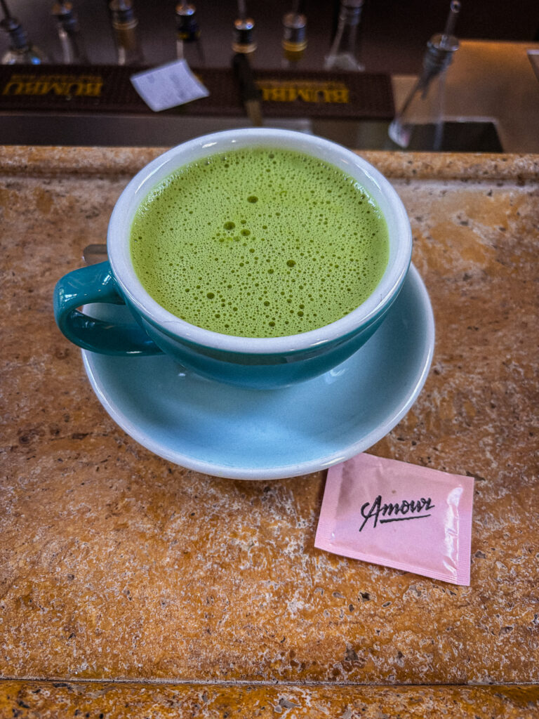 Matcha cup at Hôtel Amour Nice café on stone counter