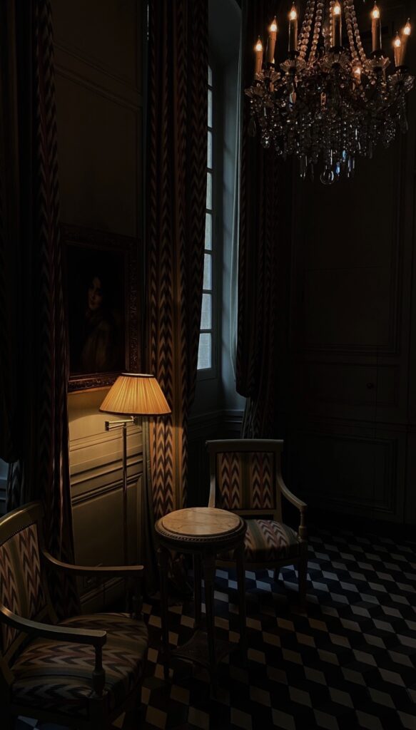 Interior salon of Hôtel La Mirande in Avignon, crystal chandelier and antique furniture