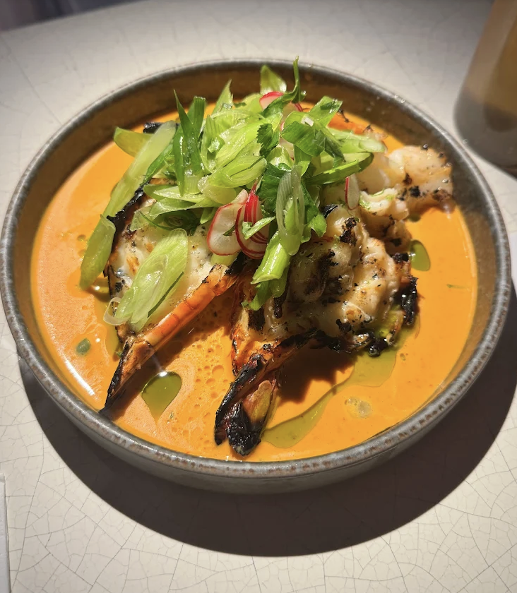 Grilled prawns in orange curry sauce at Kricket Soho London