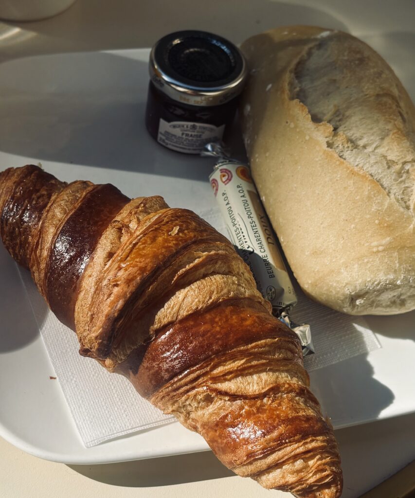 Breakfast at Le Festival restaurant in Avignon, croissant, bread, Charentes-Poitou AOP butter and strawberry jam