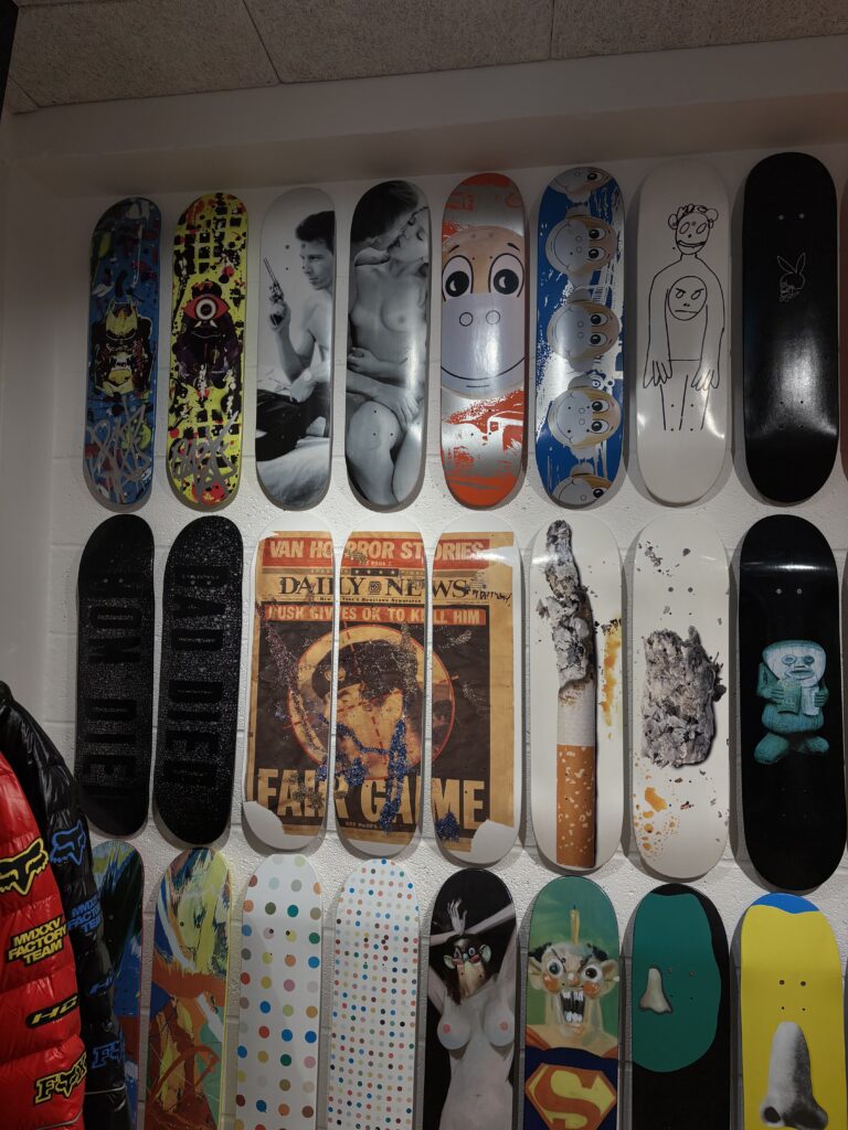 Supreme skateboard deck wall in Soho London, limited editions and artist decks