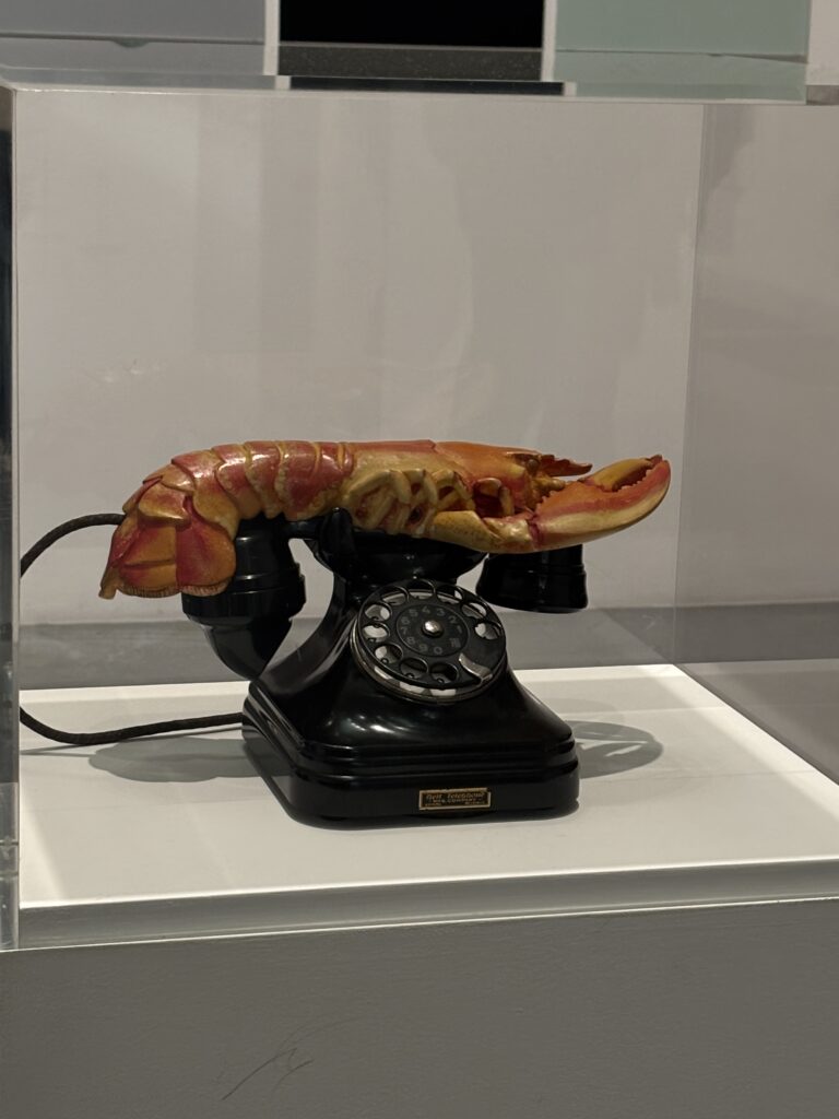 Salvador Dalí's Lobster Telephone under glass at Tate Modern London, surrealist artwork