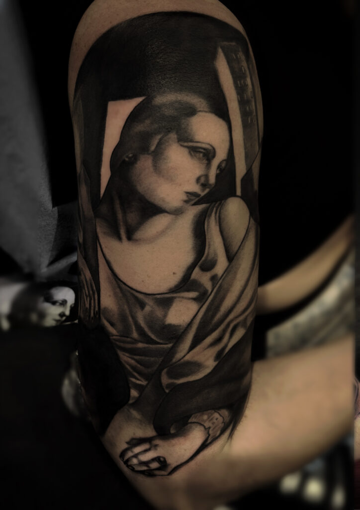 Art Deco black and grey forearm tattoo inspired by Tamara de Lempicka, by tattoo artist Tamara Chaudesaigues, available in London