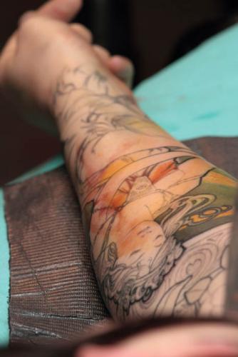 Mucha colour tattoo in progress during Jeff Gogue's seminar in Avignon