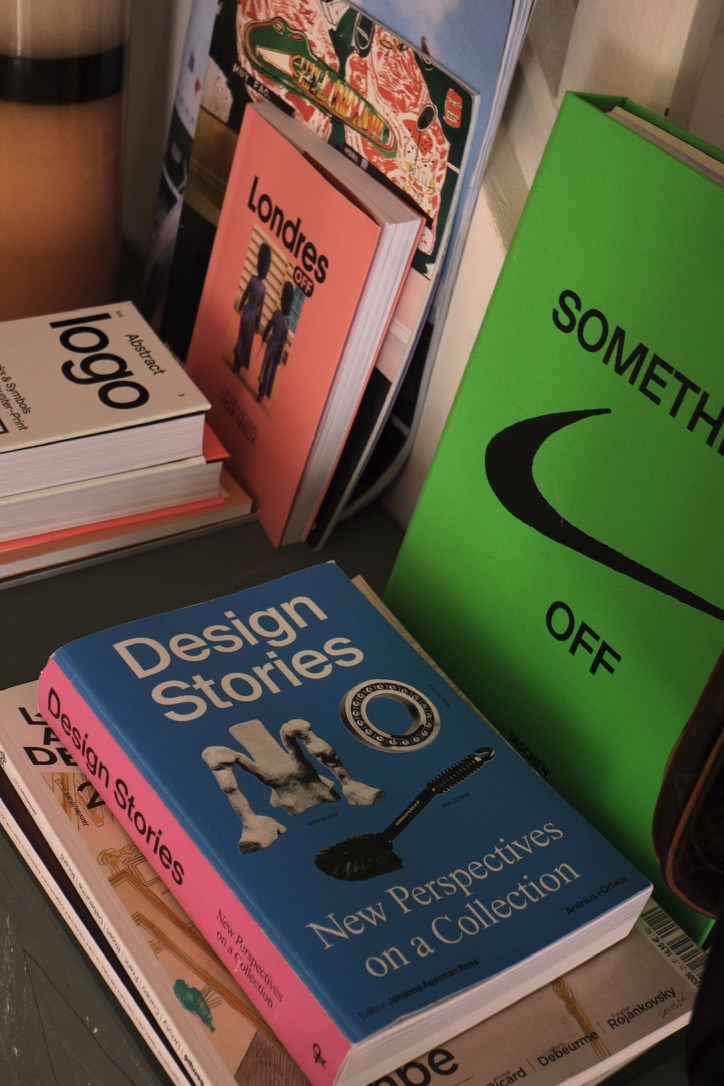 Design Stories book with the blue and pink cover photographed in the LUMA Arles bookshop