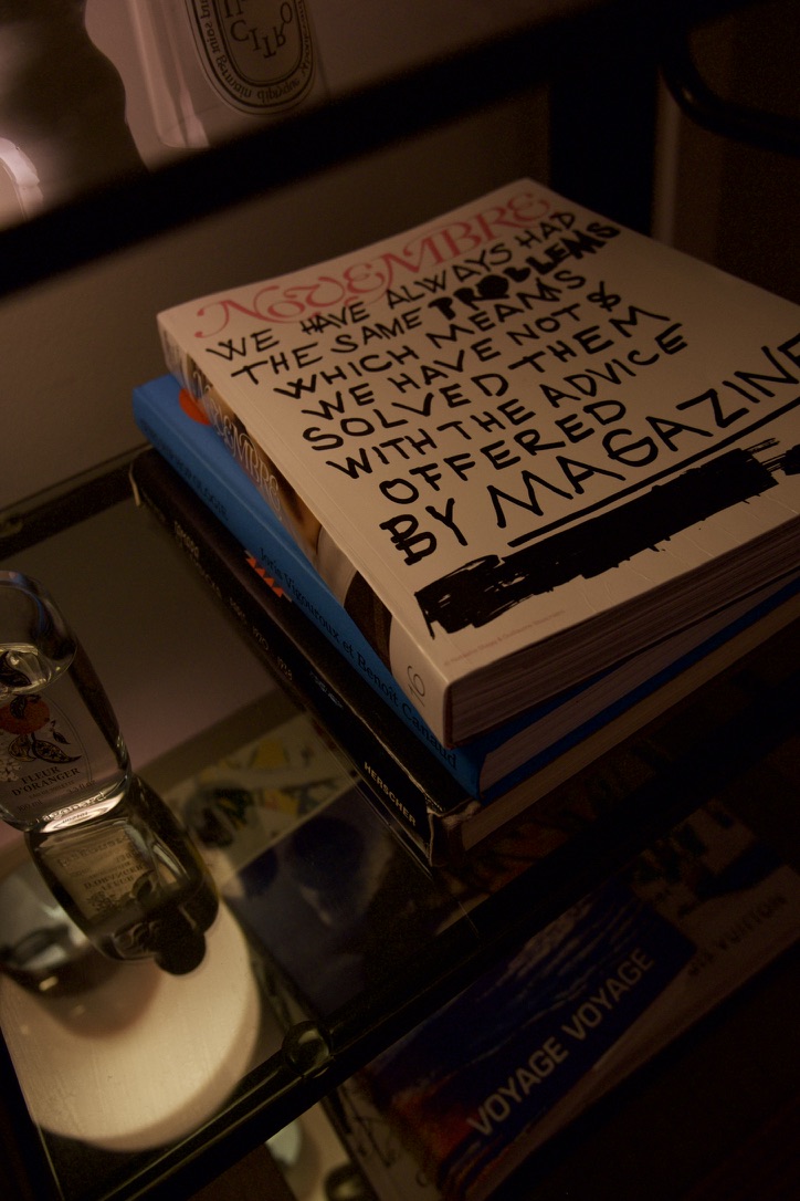 Novembre Magazine resting on a pile of books after a visit to the LUMA Arles bookshop