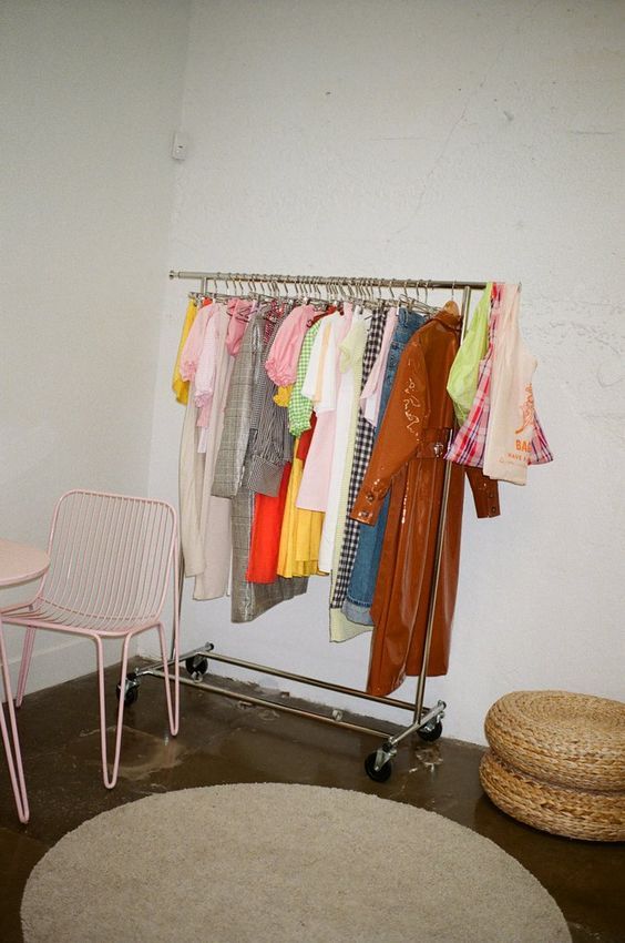A clothes rail filled with colourful garments